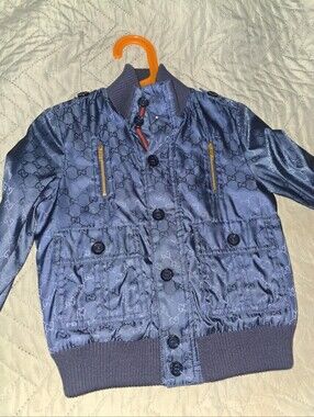 Authentic Gucci Blue Monogram Bomber Jacket with Gold Zippers